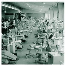 Photo showing the clinic at the Faculty of Dentistry. Over 100 dental chairs placed in a spacious room